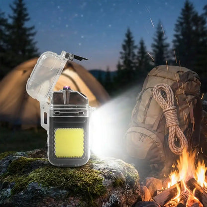 Electric lighter with transparent case, glowing white light near outdoor campfire