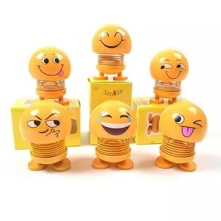 Smiley spring doll set with three stacked characters, yellow faces, spring legs