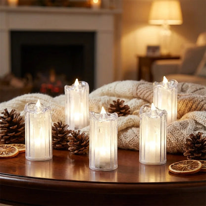 Flickering flameless LED candles in clear holders, warm white glow tips