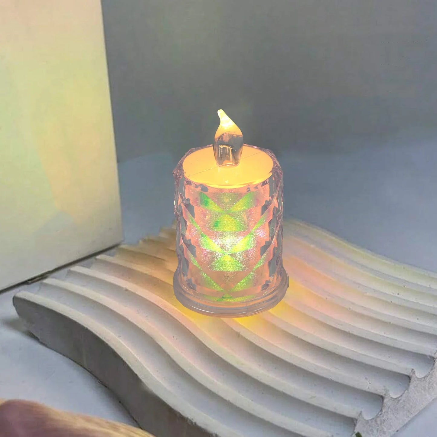 Iridescent LED tea light candle with flickering flame