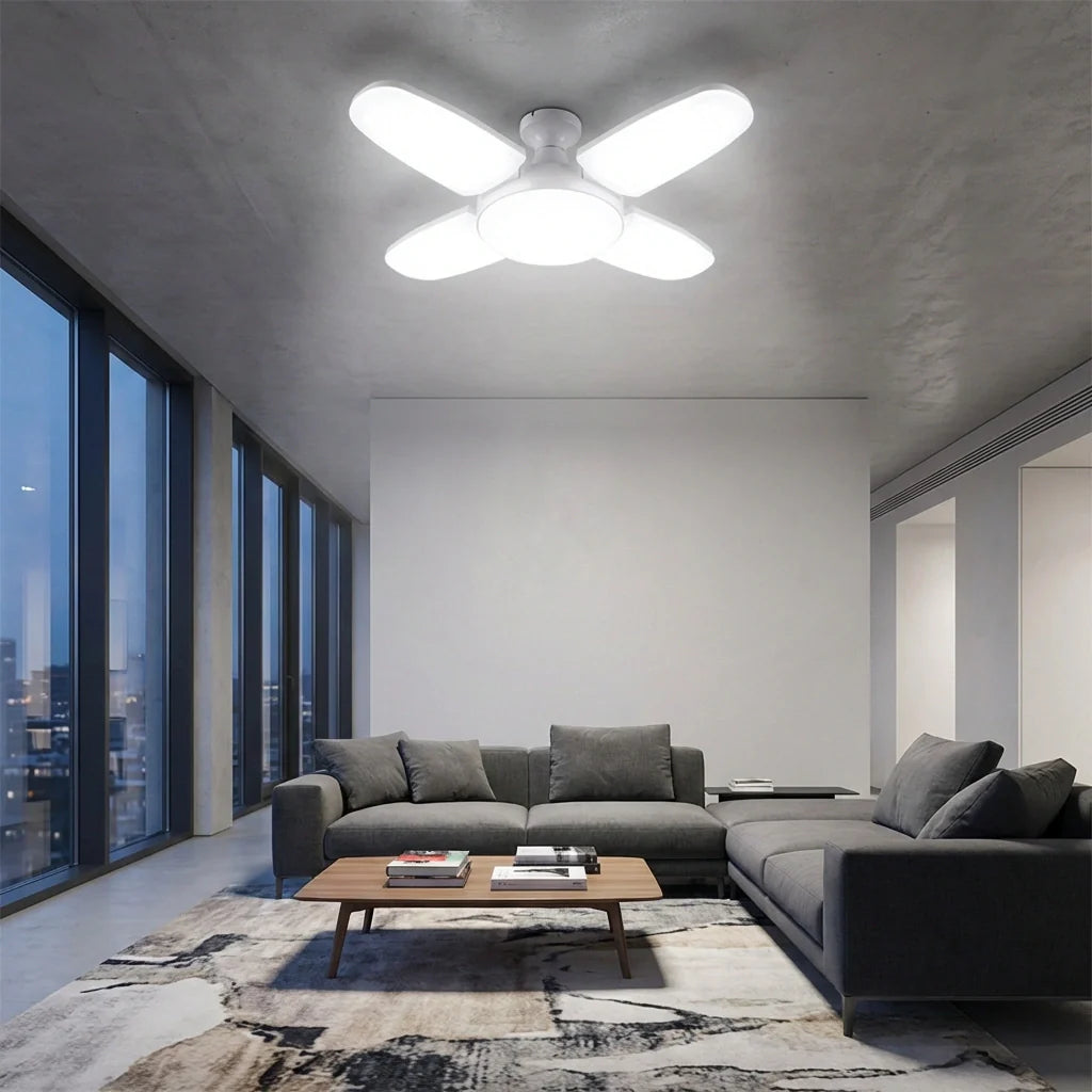 LED ceiling fan with four white blades and central light fixture