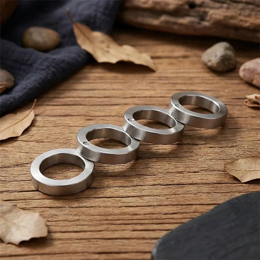 Metallic spinner stress ring with circular open band, set of four rings