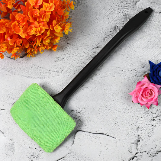 Glass cleaner wand with black handle and bright green microfiber cleaning pad
