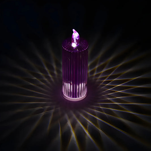 Purple LED glitter swirl candle with glowing light and textured body