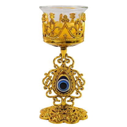 Ornate golden candle holder with floral cup and blue teardrop centerpiece