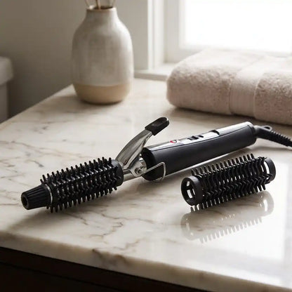 Hair curling iron with black and chrome barrel and two roller comb attachments
