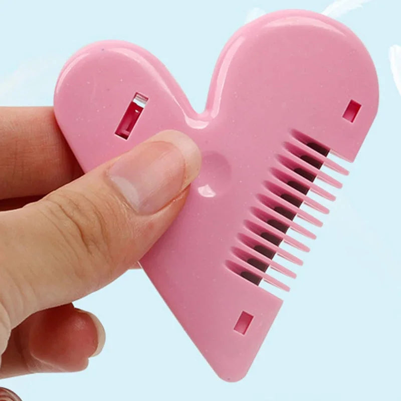 Pink heart-shaped hair scissors with comb-style cutting teeth