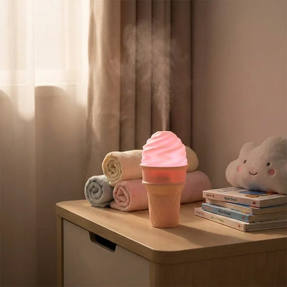 Ice cream-shaped LED humidifier with pink swirled top and cone body