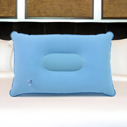 Light blue inflatable travel pillow with built-in neck support and valve detail