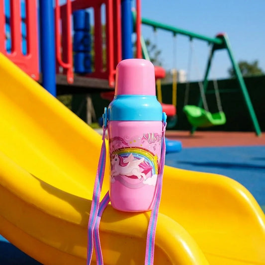 Kids insulated water bottle: pink lid, turquoise body, unicorn graphic, carry strap