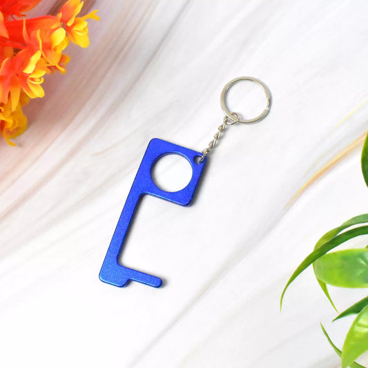 Blue key-shaped bottle opener keychain with metal ring and chain