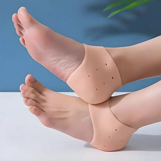 Kid heel cushion pair with beige perforated heel pads on feet