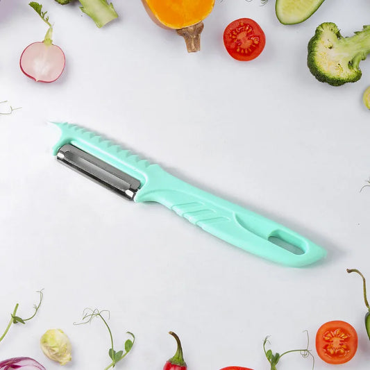 Mint green vegetable peeler with stainless steel blade and safety cover