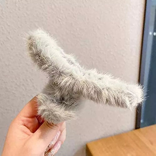 Large plush hair claw clip, fuzzy light gray, curved claw shape