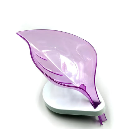 Leaf-shaped self-draining soap tray with purple shell and white base