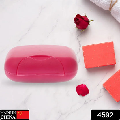 Pink leakproof travel soap case with hinged lid and soap bar pieces
