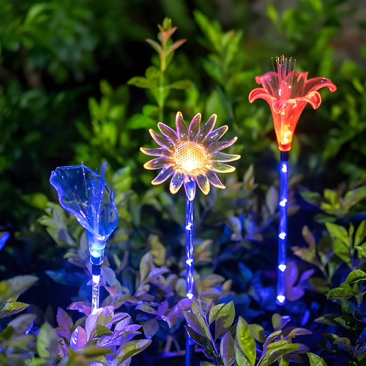 LED candle decoration lights with blue and purple flame tips on garden stems