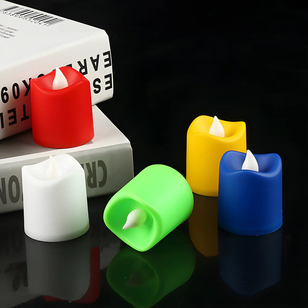 LED tealight candles set in red, white, green, yellow, and blue with white wicks.
