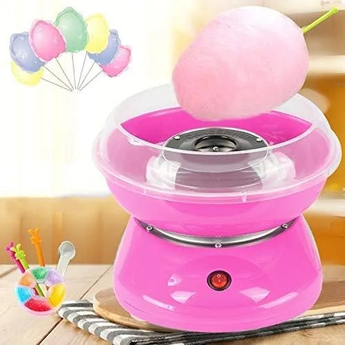 Pink cotton candy maker with clear top bowl and large pink cotton candy