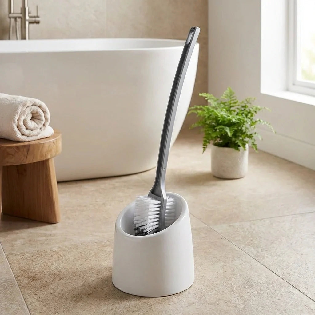 Long handle toilet brush with curved bristle head and white round holder