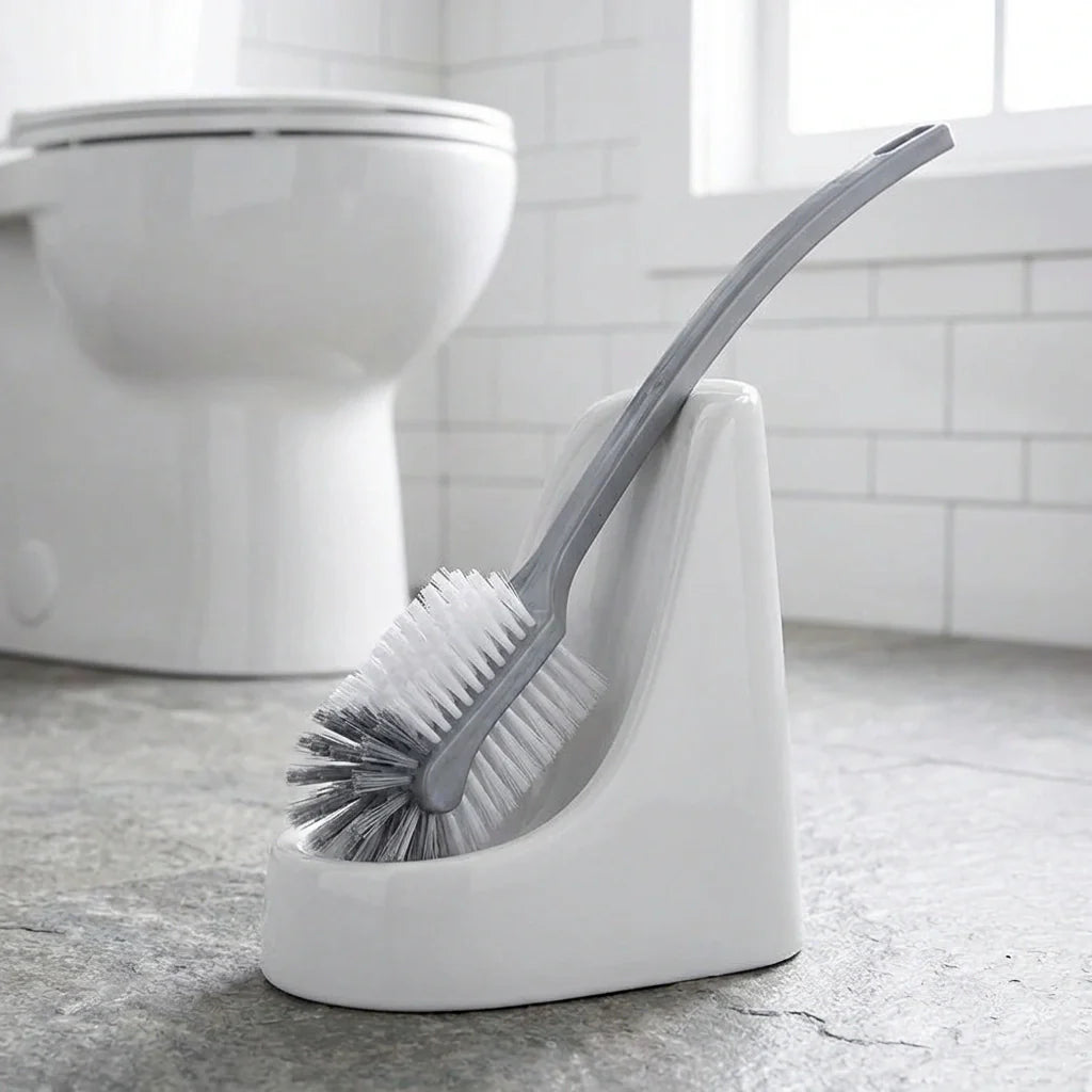 Long handle toilet cleaning brush with angled bristle head