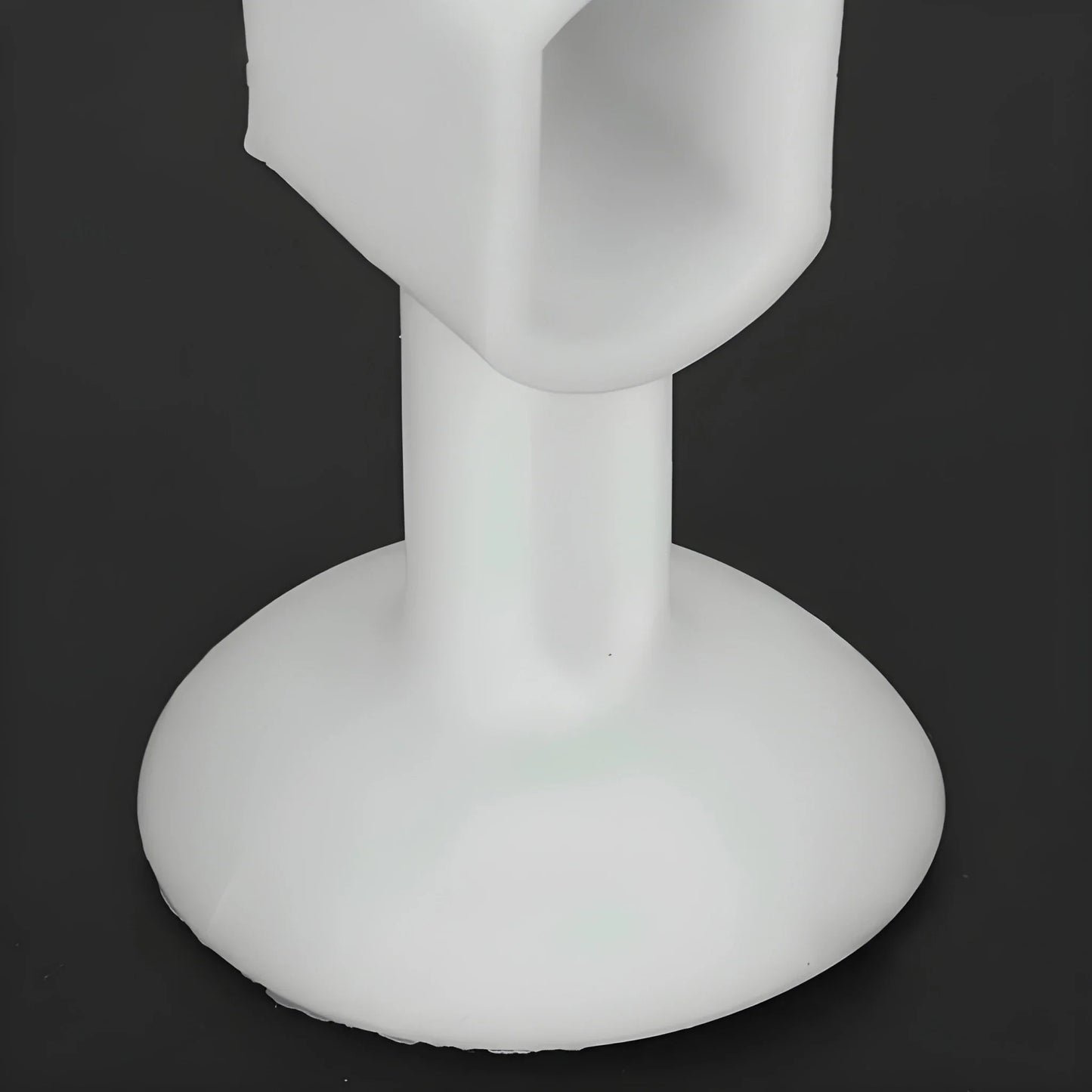Silicone wall saver with round base and vertical stem, white