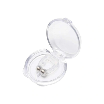 Anti-snore nose clip with clear plastic frame and metal spring, open view