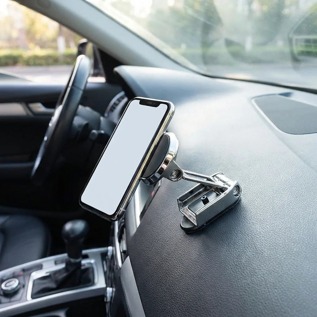 Magnetic car phone holder with white phone mounted near windshield