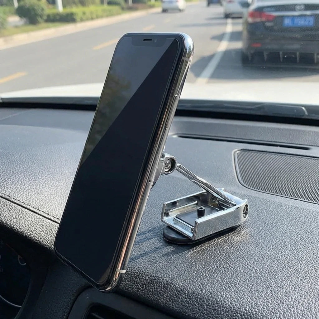 Magnetic car phone holder with dark phone angled on dashboard
