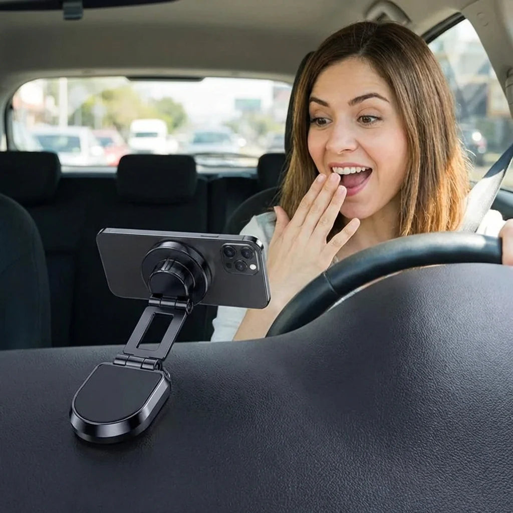 Magnetic car phone holder with phone attached and round base