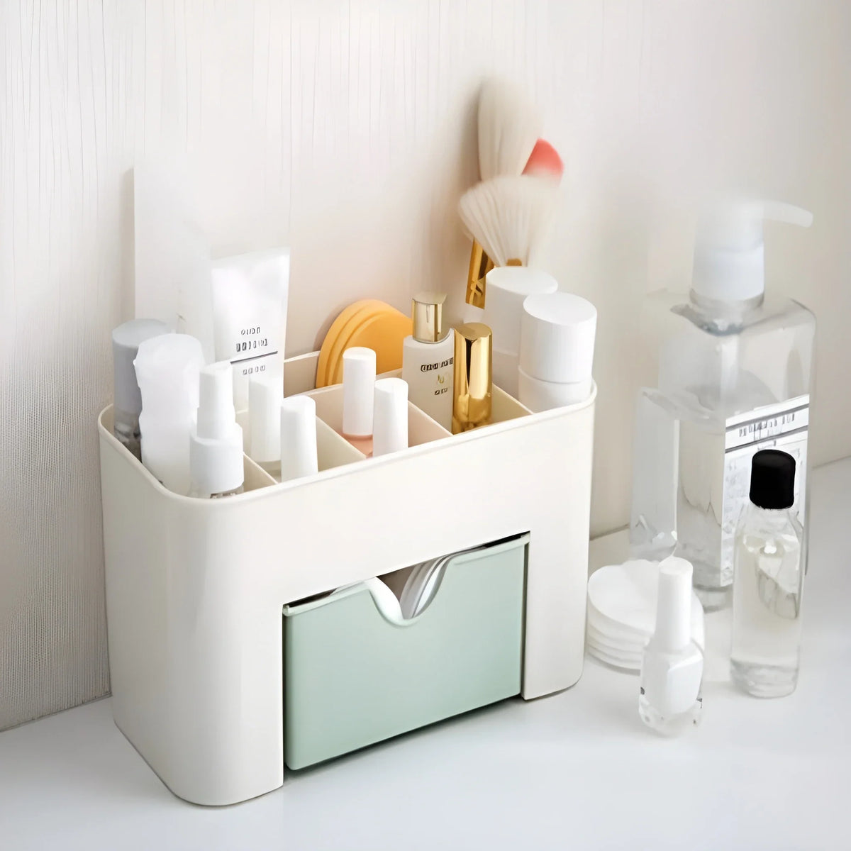 White makeup and jewelry organizer with open compartments and sliding drawer