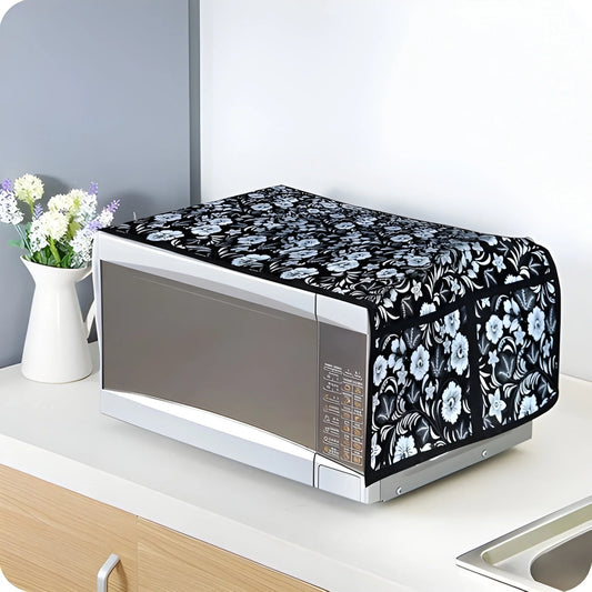 Microwave oven cover with black background and white floral pattern, padded wrap-style