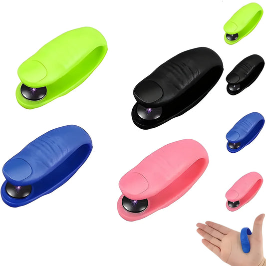 Acupressure migraine relief clip set, showing multiple colored clips and hand wearing one