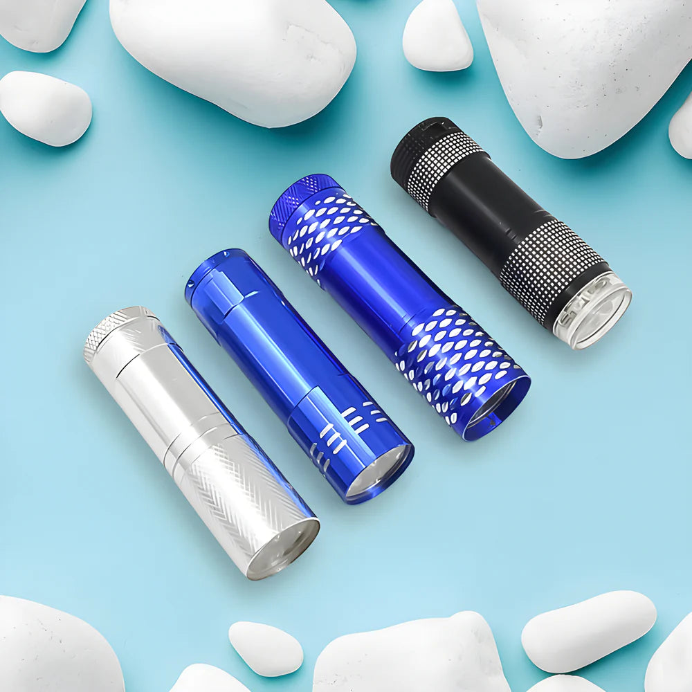 Mini LED pocket torch set with silver, blue, and black textured grip housings