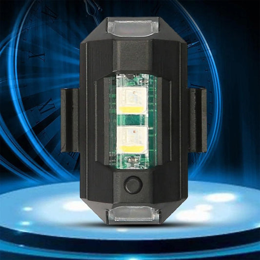 Mini LED strobe light with clear front window and circular button on black housing