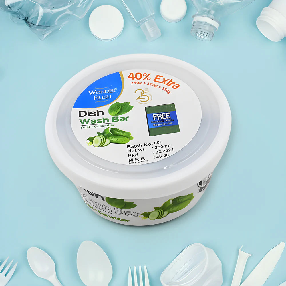 Dishwash bar in plastic tub with label, green leaf graphics and white container
