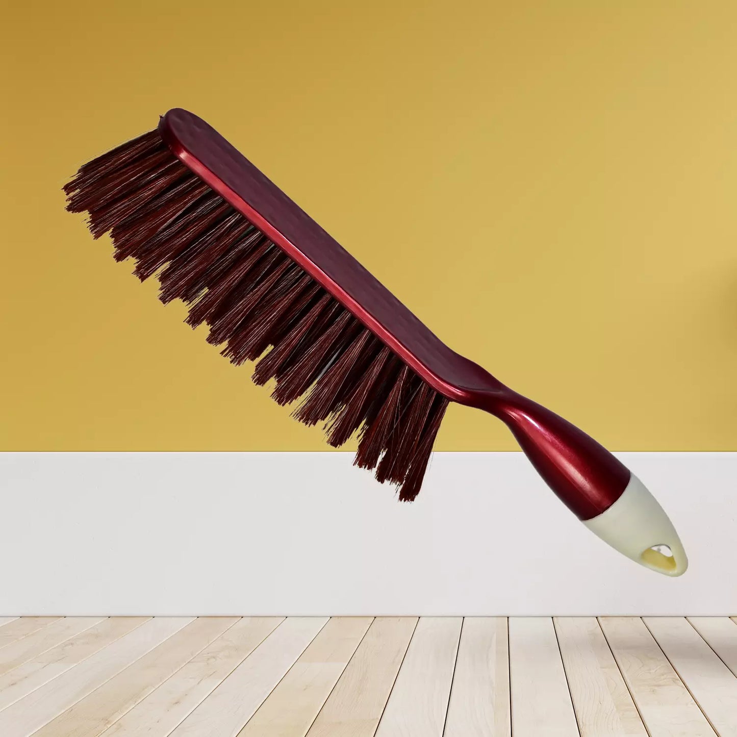 Multi-purpose cleaning duster brush with dark maroon bristles and red handle