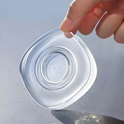 Clear oval gel grip pad with textured edge for non-slip grip