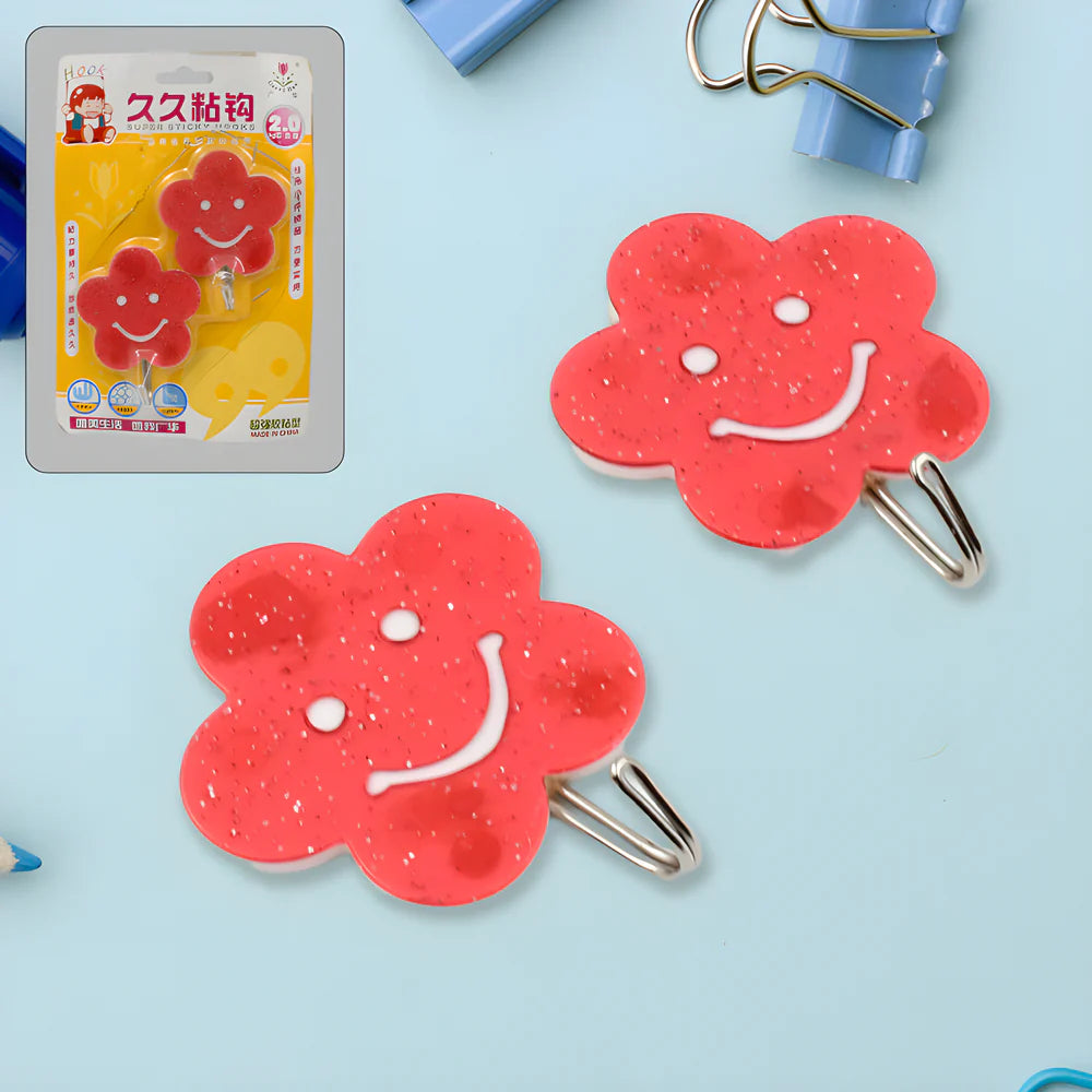 Red flower-shaped wall hook with metal keyhole clip, two hooks shown