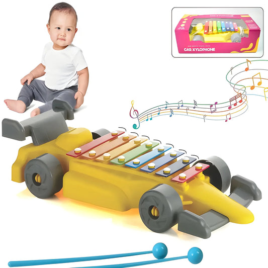 Yellow car-shaped musical xylophone toy with colored keys and two blue mallets