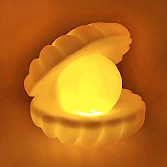 Pearl shell LED night lamp with warm glowing light