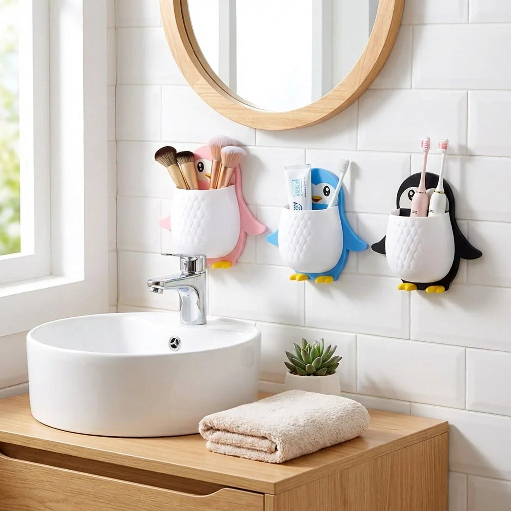 Penguin storage box holders with white fabric pouches and penguin faces, for bathroom accessories