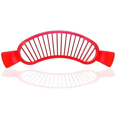 Red banana slicer tool with arched slicing grid and two side handles