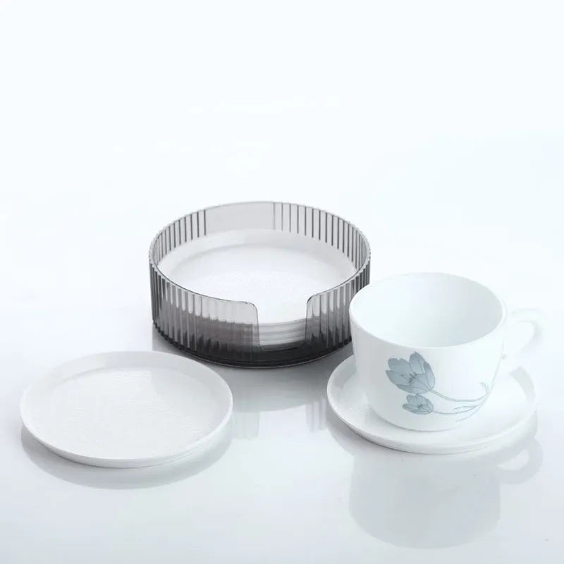 Set of round plastic coasters with ribbed edge, light gray and white (6-pack).