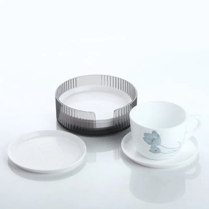 Set of round plastic coasters with ribbed edge, light gray and white (6-pack).