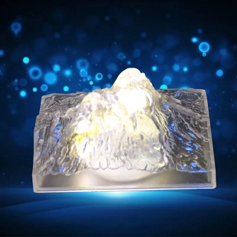 Plastic iceberg night light with bright glow and molded ice texture