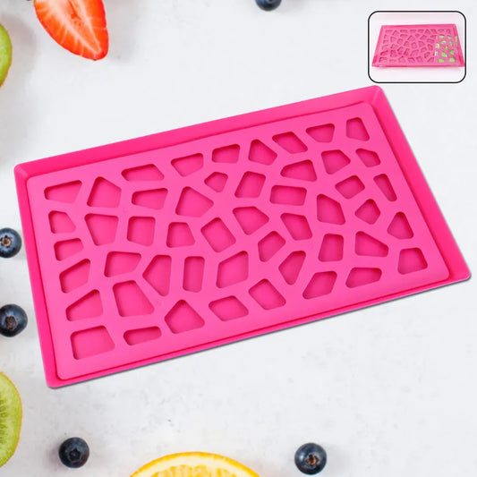 Pink plastic kitchen tray with perforated grid design, 40x25 cm