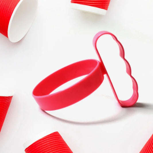 Red silicone travel cup handle with loop grip for carrying a cup