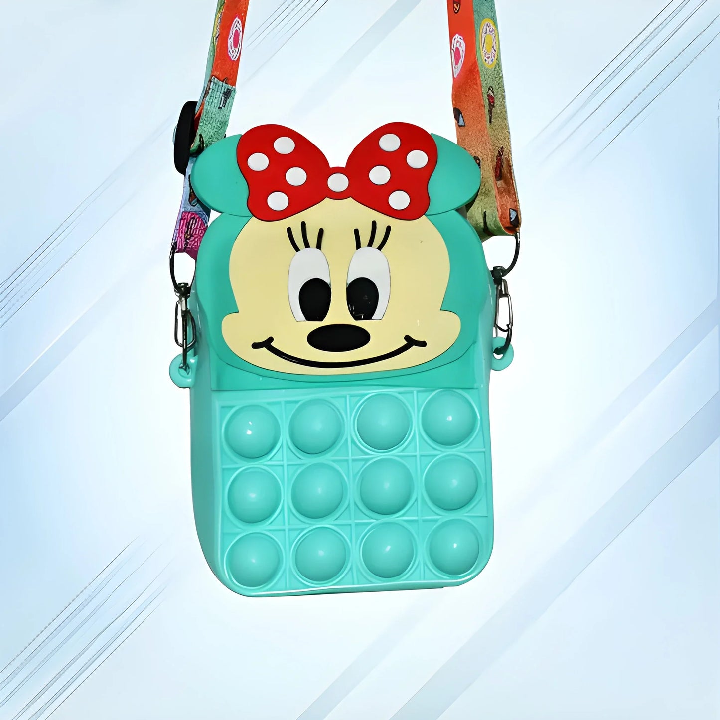 Teal kids pop-it crossbody purse with Minnie-style face, red bow, and bubble front