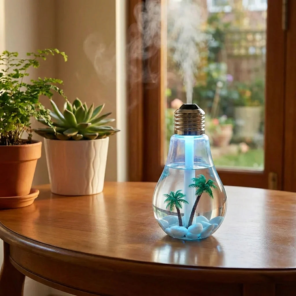 Glass bulb humidifier air freshener with palm tree print and visible mist